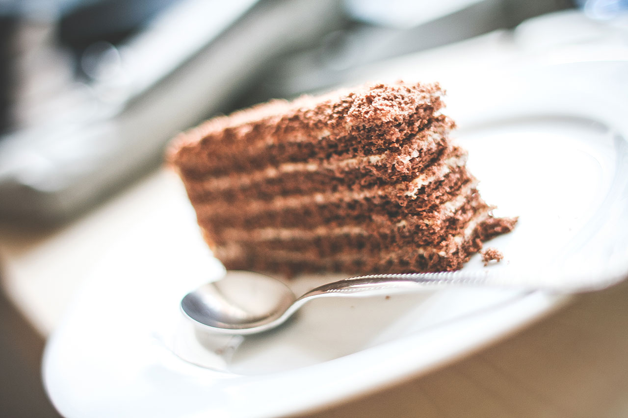 A piece of chocolate cake on top of a plate.
