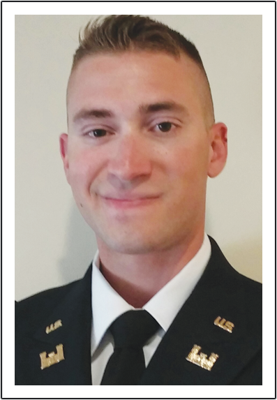 A man in uniform with a tie and white shirt.